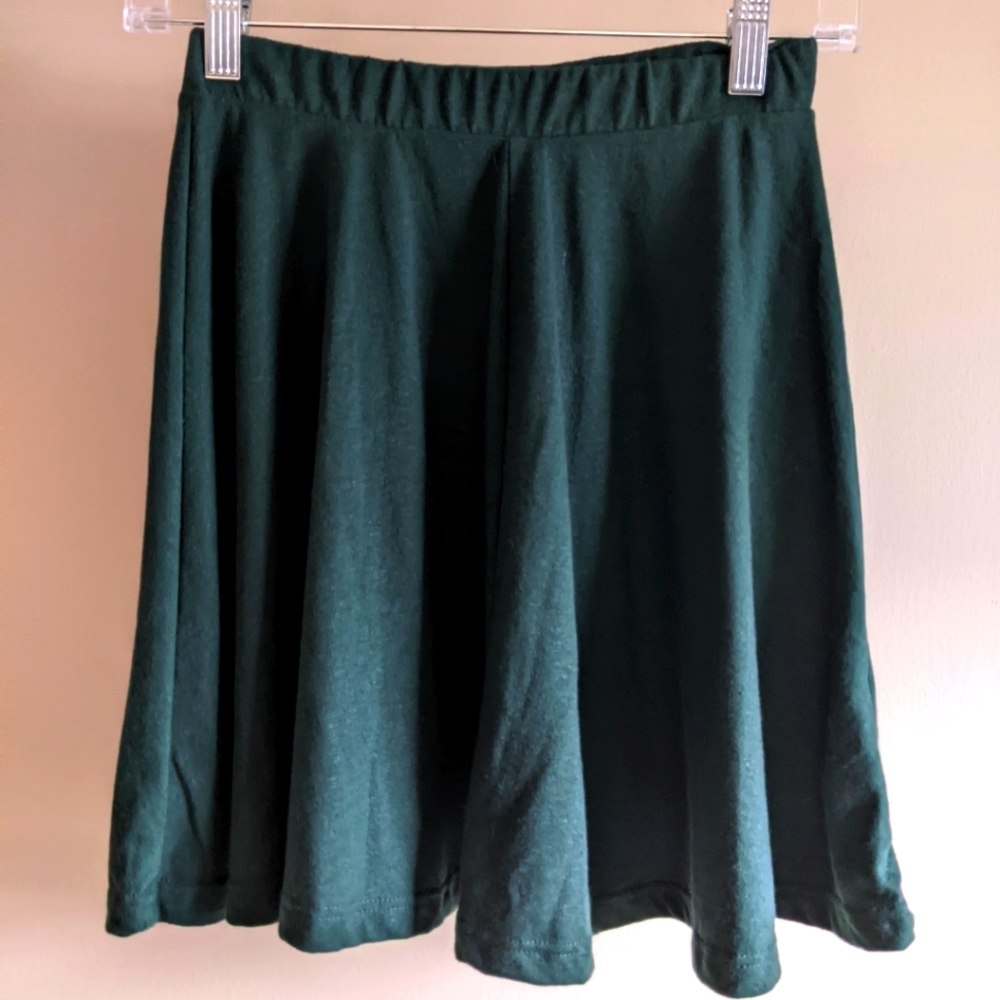 Dark green mini skirt